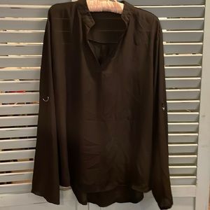 Size XL to XXL (tag removed) polyester top